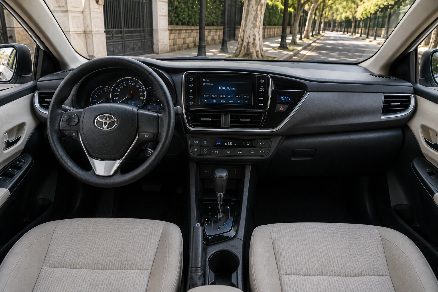 Toyota Corolla XEI automatic dashboard with climate control and light cloth interior