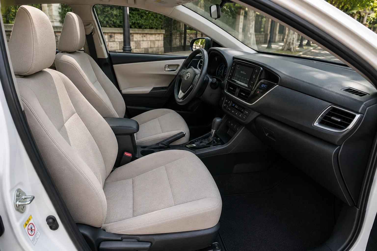 Toyota Corolla XEI light cloth front seats and automatic cabin