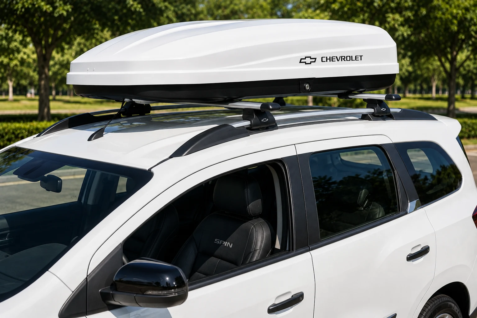 White roof cargo box on Chevrolet Spin Premier 7-seater rental car